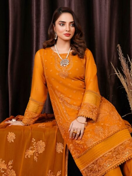 Rust orange silk suit with embroidery