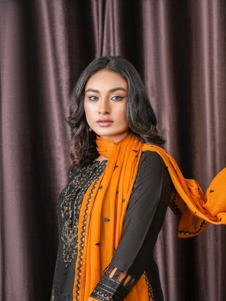 Black cotton suit with a mustard dupatta