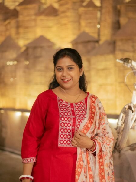 Red embroidered kurta with churidar and printed dupatta
